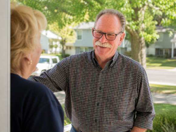 Craig Heurung talking with a St. Cloud resident Craig Heurung talking with a St. Cloud resident